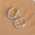 Irregular Wavy Hoop Earrings in Silver and Gold Tones view 5