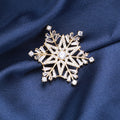 Gold Snowflake Brooch with Clear Baguette Crystals view 1