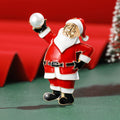 Red Enamel Santa Brooch Holding a White Pearl-Like Ball view 1
