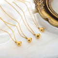Metal Teardrop Pendant Necklace Gold And Steel Tone view 2