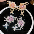 Pink Flower and Crystal Bow Stud Earrings in Two Tones view 1