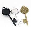 Ornate Key Shaped Round Pendant Bezel Settings in Three Finishes view 5