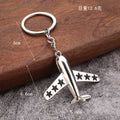 Metal Airplane Keychain With Red, Black And Blue Stars view 2
