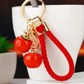 Twin Persimmon Keychains with Braided and Bare Wrist Loop Options view 1