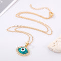 Gold Tone Crystal Evil Eye Pendant Necklaces in Two Designs view 2
