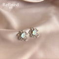 Silver Hollow Flower Stud Earrings Opalescent Oval Crystal view 3
