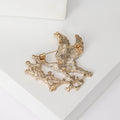 Crane and Blossom Brooch in Metal with Blue-winged Crane Perched on Red Flowering Branches view 3