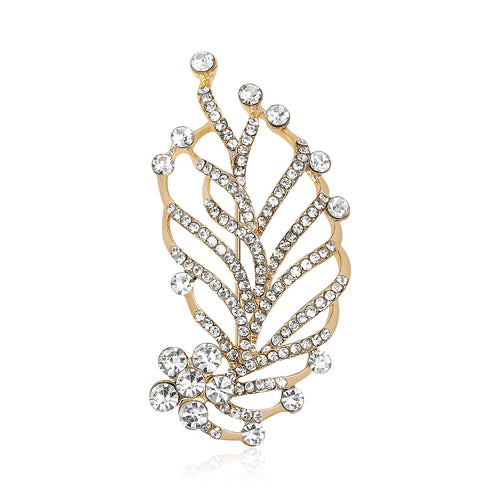 Gold-tone clear rhinestone leaf spray brooch front on white