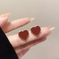 Burgundy Enamel Heart Stud Earrings Gold Tone Metal Rim view 2