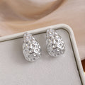 Silver Textured Teardrop Stud Earrings Hollow Hammered view 2