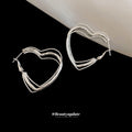 Layered Heart Outline Hoop Earrings in Silver Tone view 2