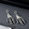 Silver Tone Skeleton Hand Pendant Necklace and Huggie Earrings view 3