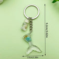 Starfish, Shell and Mermaid Charm Keychains Featuring Flower Across 29 Pictured Variations view 6