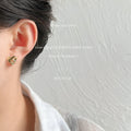 Gold Interlaced Heart Stud Earrings Clear Stone Band view 2