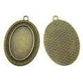 Scrollwork Oval Cabochon Pendant Settings in Two Finishes view 4