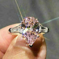 Silver Tone Pink Pear Three Stone Ring Baguette Sides 6-10 view 1