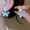 Blue Butterfly Stud Earrings with Crystals and Pearl Like Tops view 2