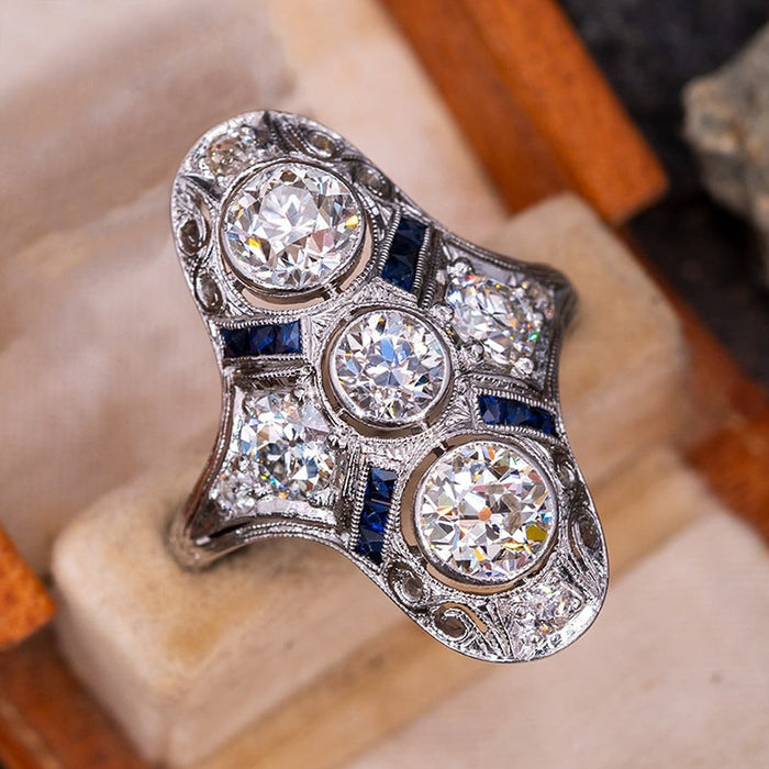 Silver-Tone Brass Elongated Ring, Clear and Blue Cubic Zirconia