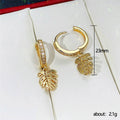 Gold Tone Monstera Leaf Huggie Drop Earrings with Polished Finish view 5