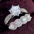 Silver Tone Round Stone and Floral Cluster Ring Set view 1