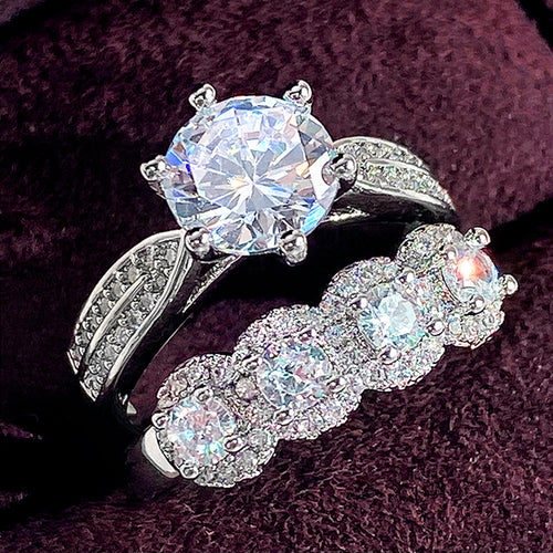 Silver Tone Round Stone and Floral Cluster Ring Set shown in front view