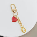 Gold-Tone Letter Charm Keychain with Red Heart Accent view 9