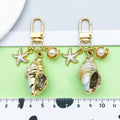 Starfish, Conch and Shell Charm Keychains Featuring Conch Across 59 Pictured Variations view 2