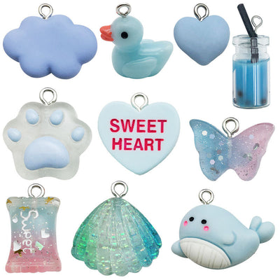 Printed detail graphic for the dolphin and butterfly charms