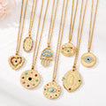 Gold Tone Colorful Crystal Evil Eye Hamsa and Mary Pendant Necklaces view 1