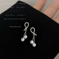 Silver Tone Clear Stone Knot And Double White Pearl Tassel Earrings view 3