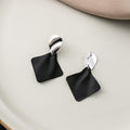 Silver Rippled Oval and Black Diamond Dangle Earrings view 3