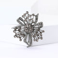 Gunmetal Rhinestone Floral Knot Brooch with Layered Loops view 1