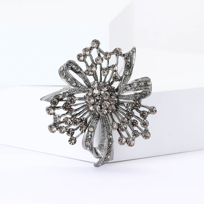 Gunmetal Rhinestone Floral Knot Brooch with Layered Loops