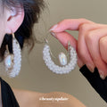 Silver Mesh Hoop Earrings with Pearl Centers with Polished Metal Details view 1