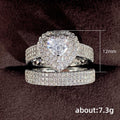Heart-Shaped Solitaire Halo Two-Ring Set In Three Metal Tones view 5