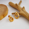 Twelve Gold Tone Sculptural Knot and Hoop Earring Collection view 6