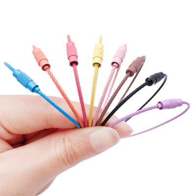 Colorful assorted shape charms shown in a close-up product view