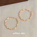 Twisted Faceted Metal Hoop Earrings Gold Silver Tones view 4