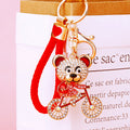 Jeweled Bicycle Bear Keychains in Blue Red and Black with Braided Loops view 3