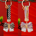 Striped Crystal Bow Keychains with Jeweled Wrist Straps in Five Colors view 1