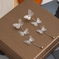 Triple Butterfly Extra Long Stud Earrings in Gold and Silver view 4