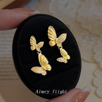 Gold Dual Butterfly Drop Earrings Crystal Pavé Wings