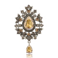 Teardrop Glass Brooch With Ornate Antique Tone Crystal Frame view 1