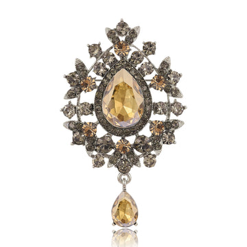 Teardrop Glass Brooch With Ornate Antique Tone Crystal Frame
