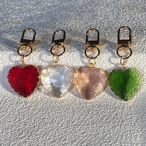 Close-up showing the colors and surface details of large Faceted Translucent Heart Clip Keychains in Six Colors