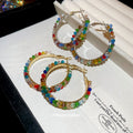 Multicolor Crystal Hoop Earrings In Silver And Gold view 1