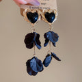 Heart and Petal Cascade Drop Earrings in Ivory with Polished Details view 3