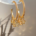 Gold Crystal Paved Hoop Multi Star Charm Drop Earrings view 1