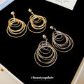 Layered Metal Circle Drop Earrings with Reflective Details view 4