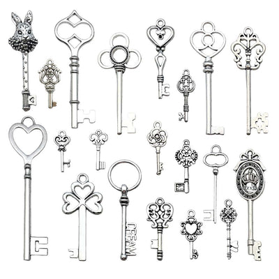 Metallic assorted shape charms arranged on a light background